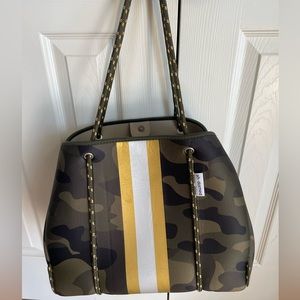 Ah-dorned shoulder-bag